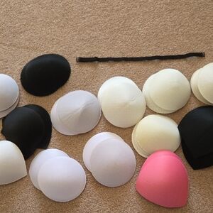 34 Assorted Bra Inserts, 1 Strap, And 1 Bra Extender